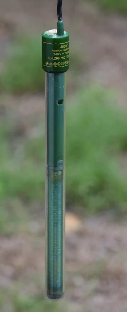 A glass submersible aquarium heater.